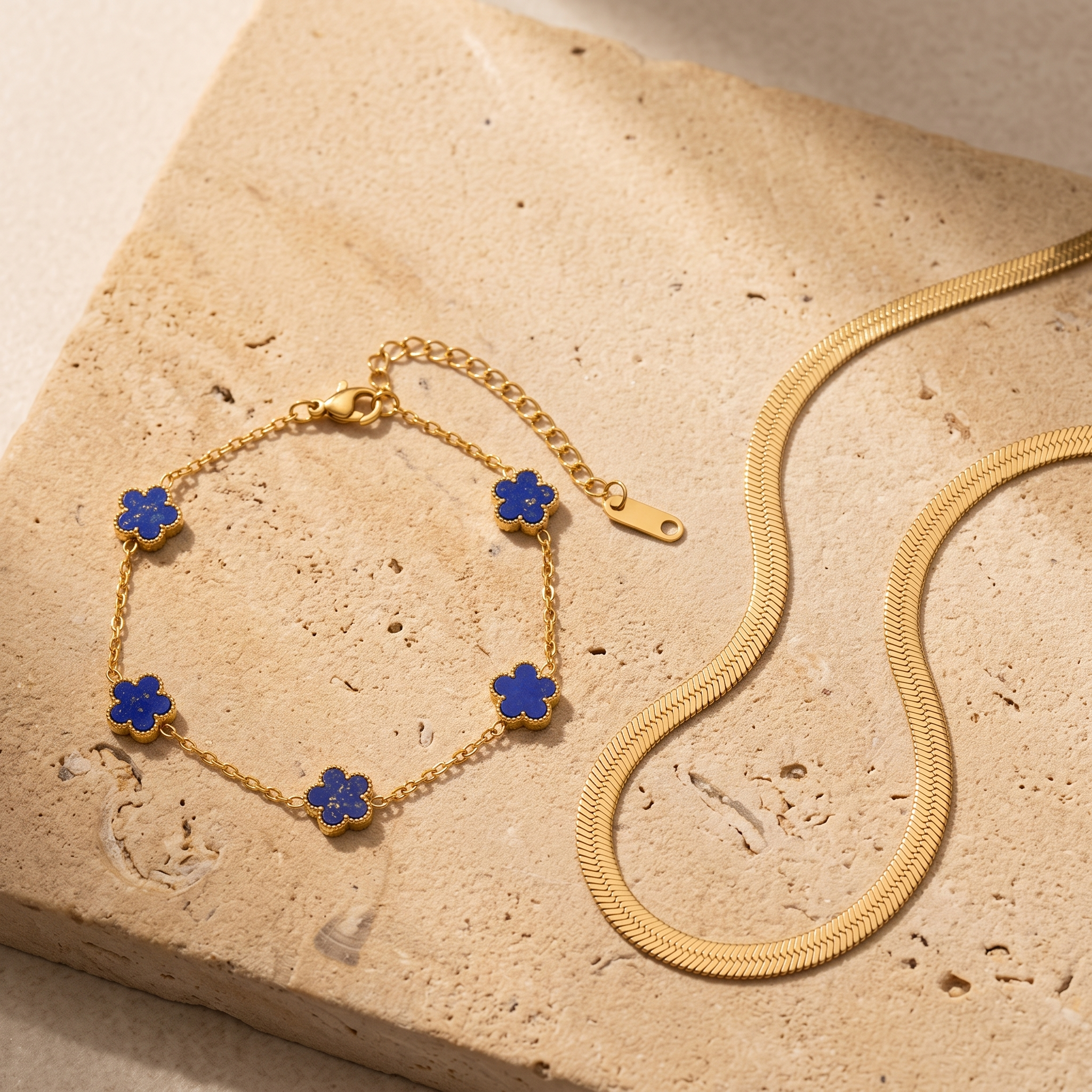 The Riviera Blue Duo — blue clover bracelet and gold herringbone necklace